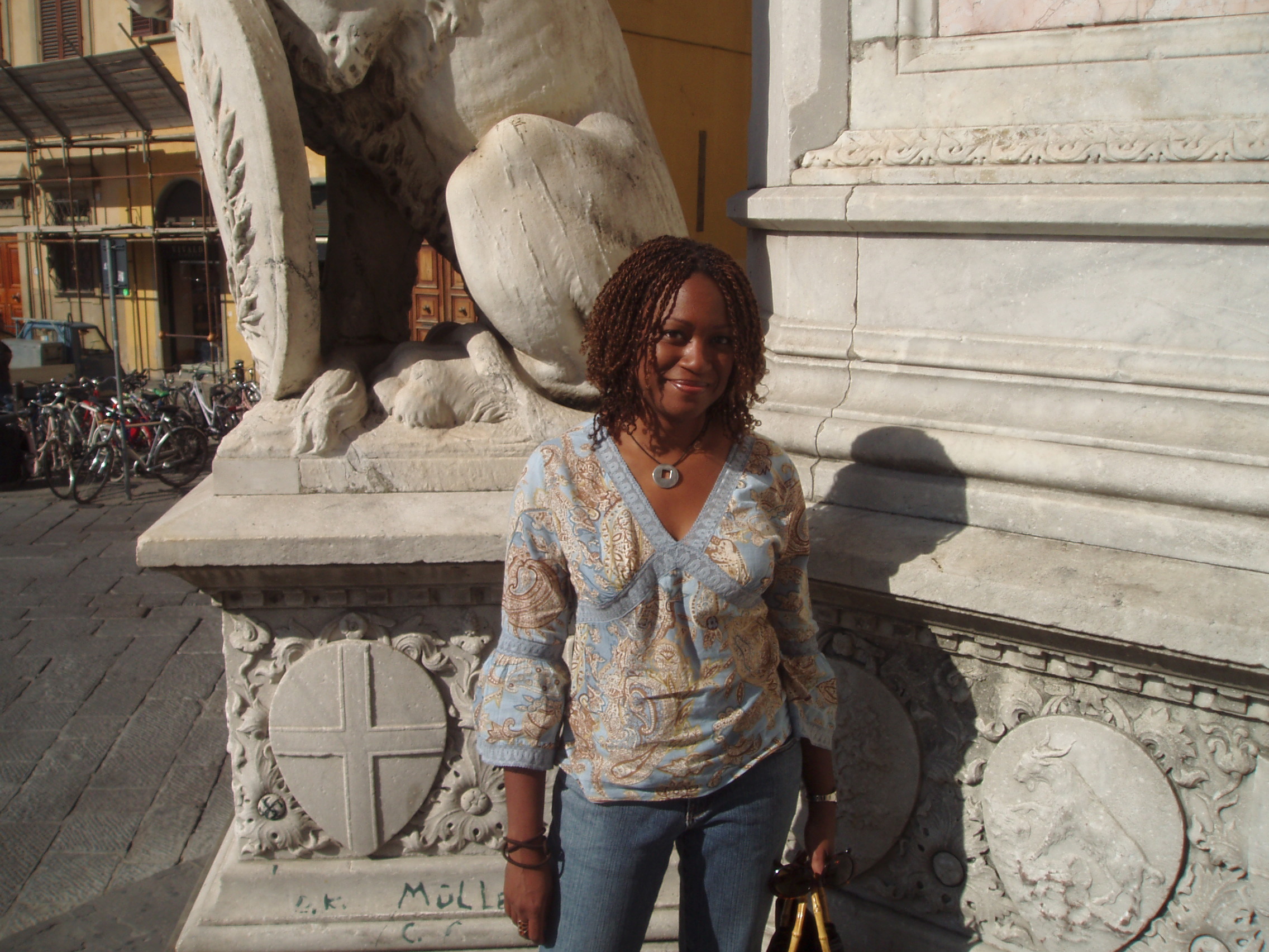 P9200063 A slightly younger (and more serene) me, standing outside the historic Basilica di Santa Croce in Florence.